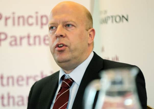 FEELING THE PRESSURE - Cobblers chairman David Cardoza, pictured at this week's announcement that University of Northampton will be the club's new sponsor (Picture: Kirsty Edmonds)
