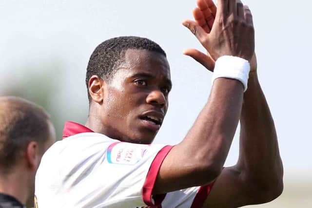 SIXFIELDS RETURN - Liam Davis applauds the Cobblers fans following what was to prove his final appearance for the club, at Morecambe in May, 2011