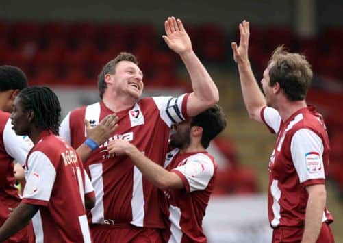 Cheltenham celebrate their winner at Whaddon Road (picture: Kirsty Edmonds)