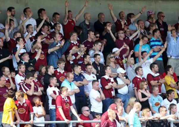 WEAR YOU COLOURS WITH PRIDE - Saturday's game between the Cobblers and Barnet is a claret day at Sixfields