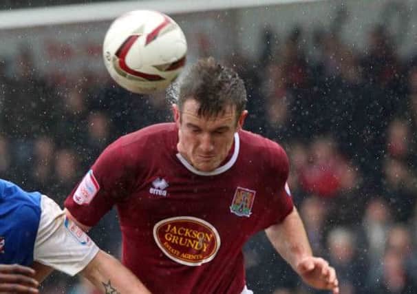 CLEARED FOR ACTION? - Cobblers defender Lee Collins