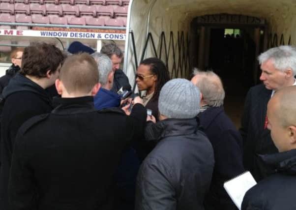CENTRE OF ATTENTION - Barnet boss Edgar Davids faces the media following Barnet's defeat to the Cobblers, and relegation to non-League