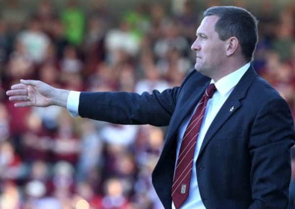 STRANGE DAY - Bradford-born Cobblers boss Aidy Boothroyd will take on the Bantams at Wembley (Picture: Sharon Lucey)