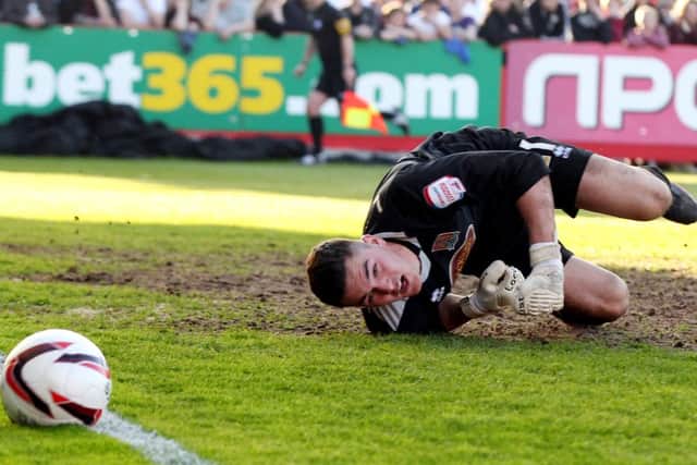 SAFE HANDS - Cobblers goalkeeper Lee Nicholls
