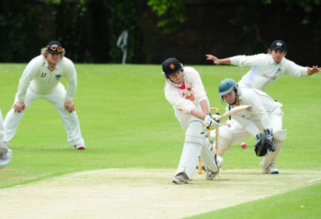 ON THE SWEEP - Steve Brooks bats for Oundle in their premier division defeat to Peterborough