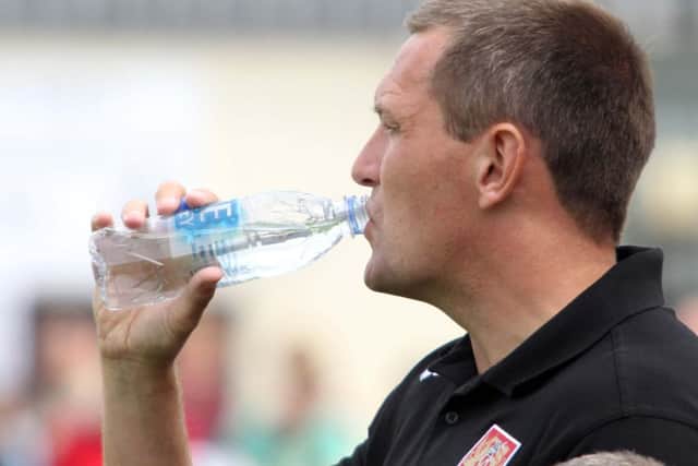 THIRSTY WORK - Cobblers boss Aidy Boothroyd says the Town players have been worked extremely hard on the training camp in Croatia