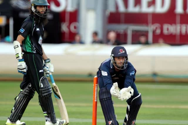 Moeen Ali (left) made 72 in Worcestershire's 182-6