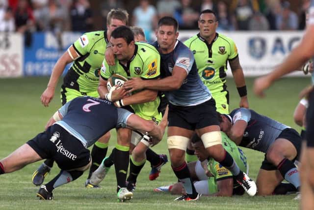 Phil Dowson is tackled during Saints' pre-season friendly at Bedford (pictures: Tony Waugh)