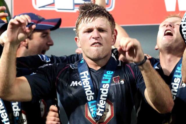 Man-of-the-match David Willey celebrates Northamptonshire's t20 success