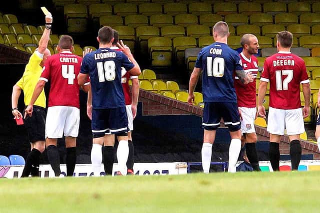 OFF YOU GO - Chris Hackett leaves the field after being shown his second yellow card at Southend