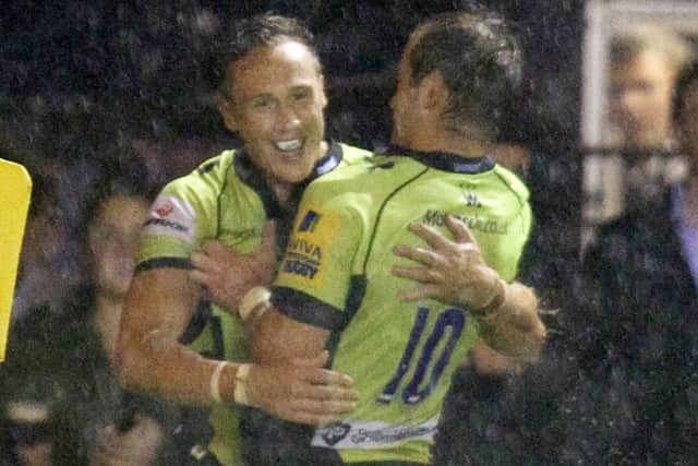 WELL DONE - Stephen Myler congratulates James Wilson after his match-winning try at Harlequins (picture: Linda Dawson)