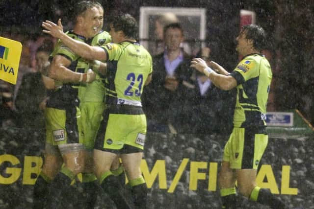 James Wilson is congratulated after scoring the match-winning try at Harlequins (pictures: Linda Dawson)