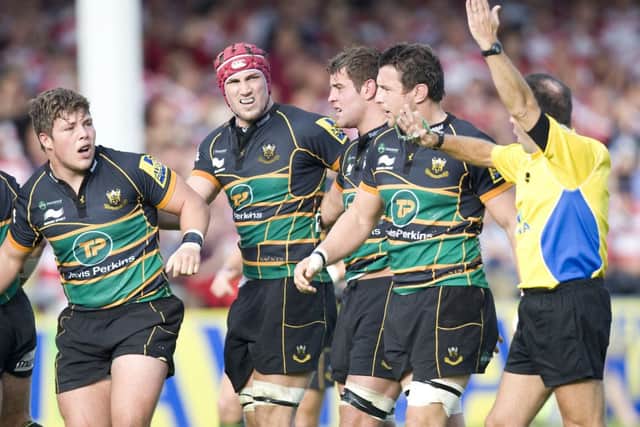 FLASHPOINT - Martin Fox awards a late penalty to Gloucester, to the dismay of the Saints players (picture by Linda Dawson)