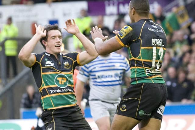 HIGH FIVE - Jamie Elliott and Luther Burrell celebrate Saints' win against Saracens in October (Picture: Linda Dawson)
