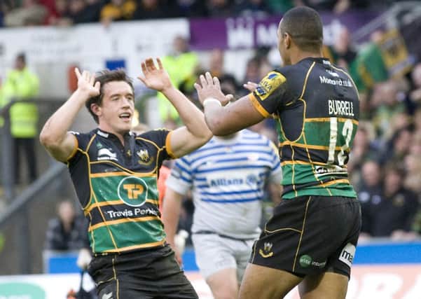 HIGH FIVE - Jamie Elliott and Luther Burrell celebrate Saints' win against Saracens in October (Picture: Linda Dawson)