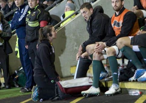 RULED OUT - George North, seen here receiving treatment after leaving the field in the first half of last week's win over Harlequins, is not fit to play at Bath on Friday (Picture: Linda Dawson)