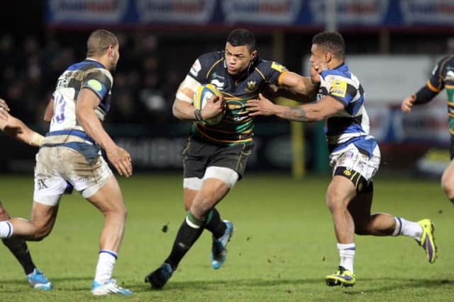 UP FOR THE FIGHT - Luther Burrell brushes off Bath players in Saints' win at Franklin's Gardens in December (Picture: Linda Dawson)