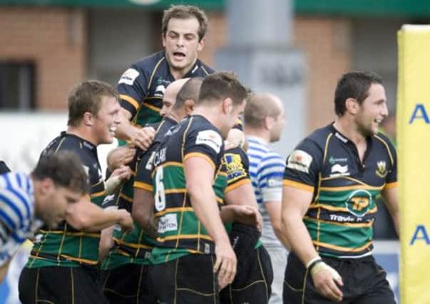 CELEBRATION TIME? - Saints will be hoping they will enjoy a long overdue east midlands derby win over Leicester Tigers (Picture: Linda Dawson)