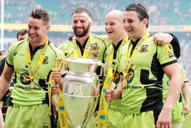 ALL SMILES - Phil Dowson (right) celebrates Saints' Aviva Premiership Final win with Calum Clark, Tom Wood and Sam Dickinson (Picture: Kirsty Edmonds)