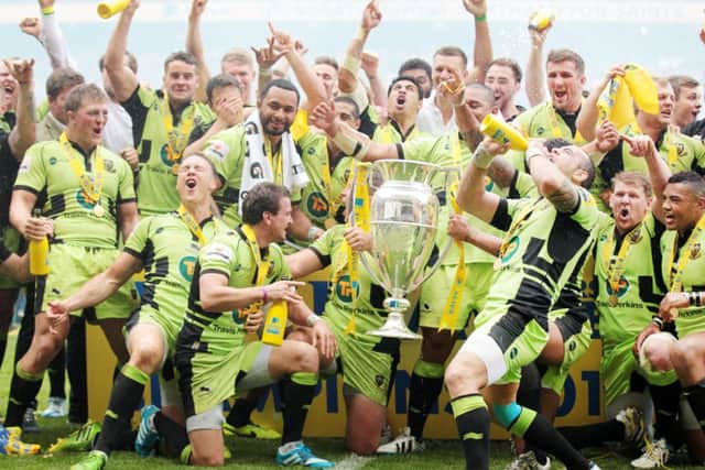 GLORY BOYS - Saints celebrate their title triumph (Pictures: Kirsty Edmonds)