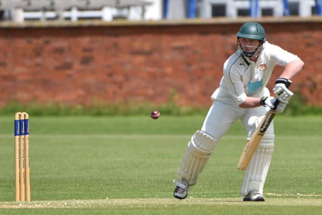 ALL-ROUND EFFORT - Rob White on his way to 80 in Old Northamptonians' win over Rushden (Picture: Dave Ikin)