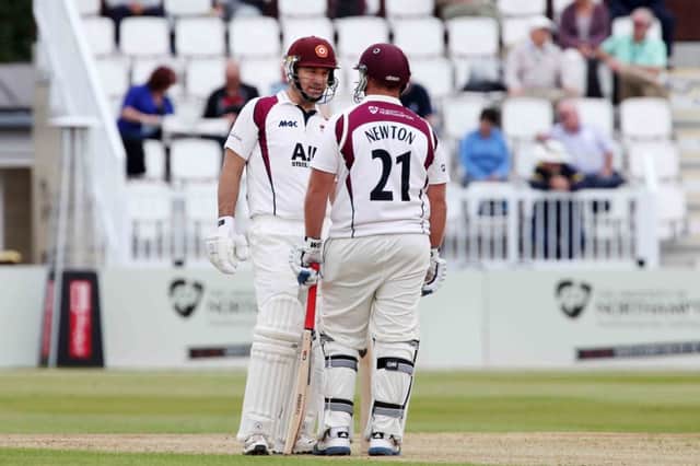 James Middlebrook chats with Richard Levi (don't mind the shirt) during Northants' first innings