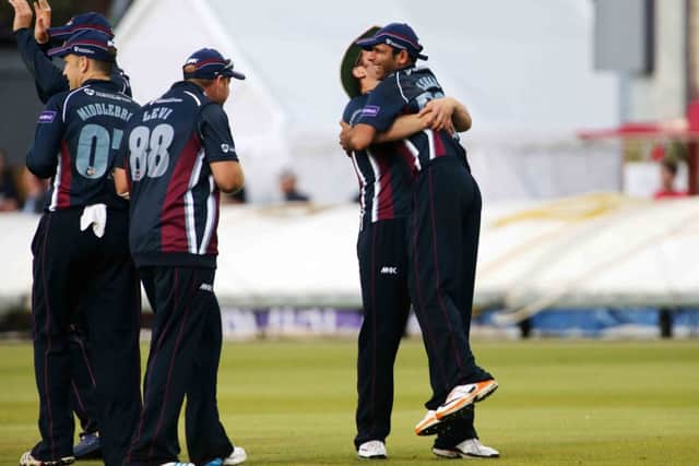 Muhammad Azharullah is congratulated after catching Paul Collingwood for a golden duck