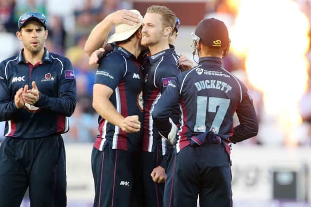 STAR MAN - Graeme White celebrates with Steven Crook after the pair combined to dismiss Birmingham Bears' Rikki Clarke (Picture: Kirsty Edmonds)