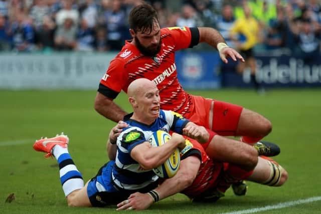 Leicester's Tom Croft and Niall Morris fail to stop Bath's Peter Stringer from scoring a try during their Premiership clash last weekend