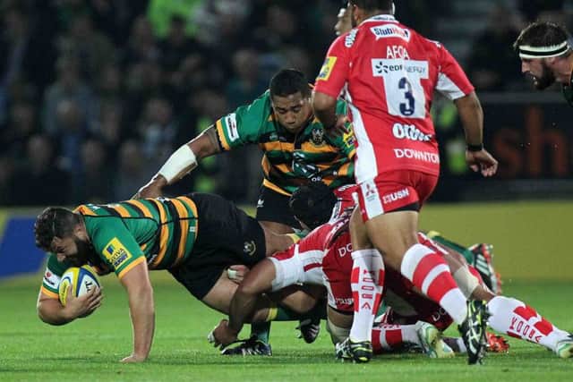 TURNING UP THE POWER - Salesi Ma'afu and Alex Corbisiero get stuck into Gloucester at Franklin's Gardens three weeks ago (Picture: Sharon Lucey)