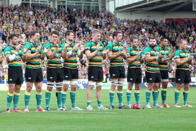 EMOTIONAL MOMENT - the Saints players join in the minute's applause for Luis Ghaut ahead of Saturday's win over Bath (Picture: Sharon Lucey)