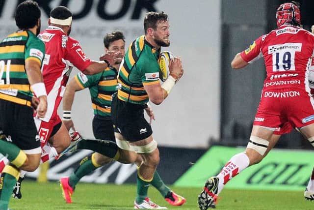 ON THE CHARGE - Jon Fisher has made a big impression on team-mate Calum Clark (pictured below)