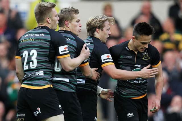 Tom Collins is congratulated on the first of his two tries against Newcastle in the LV= Cup (pictures: Sharon Lucey)
