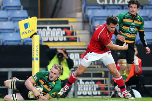 DOTTING DOWN - Ben Nutley goes over for his try for Saints against London Welsh (Pictures: Kirsty Edmonds)