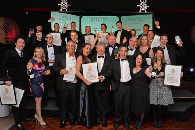 Centre, Simon Weston OBE with all the winners of Northamptonshire Business Excellence Awards held at the Daventry Court Hotel. (PICTURE: ANDREW CARPENTER)