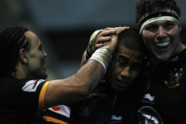 HAT-TRICK HERO - Ken Pisi (centre) is congratulated by Kahn Fotuali'i and Ethan Waller (picture: Sharon Lucey)