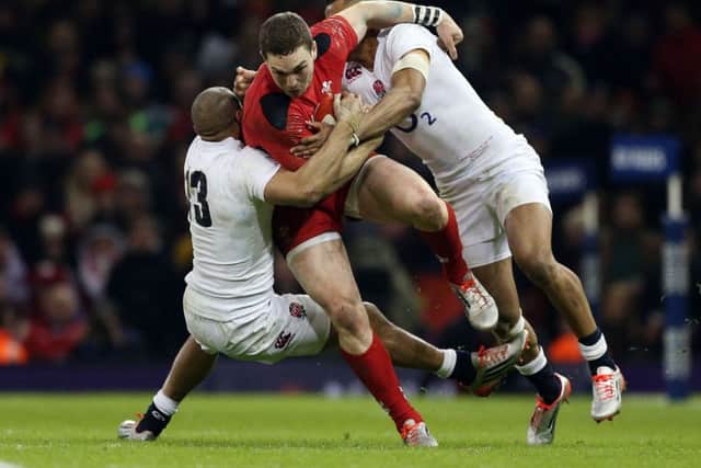 BEING ASSESSED - George North suffered two blows to the head in Wales' defeat to England