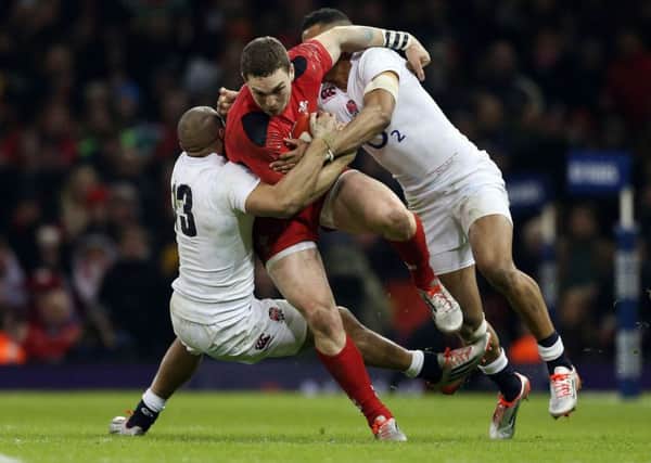 BEING ASSESSED - George North suffered two blows to the head in Wales' defeat to England