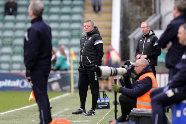 NOT HAPPY - Cobblers boss Chris Wilder watches his team lose to Plymouth on Saturday (Picture: Kirsty Edmonds)