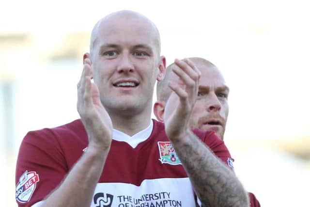 HAPPY MAN - Ryan Cresswell applauds the Cobblers supporters following Saturuday's win over Tranmere (Picture: Sharon Lucey)