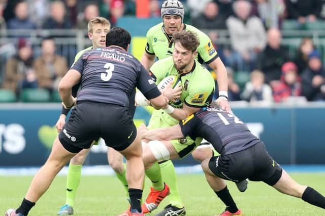 BACK IN ACTION - Jon Fisher on the attack for Saints in Saturday's clash with Saracens (Picture: Kirsty Edmonds)
