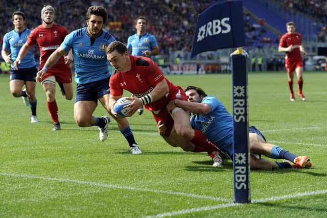 Wales' George North runs in to score his second and his side's fourth try