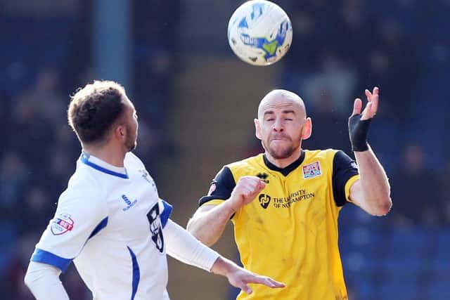 STILL AIMING HIGH - Cobblers defender Tom Newey (Picture: Kirsty Edmonds)