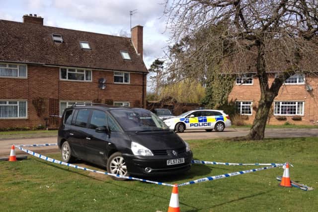 A black people carrier was cordoned off outside the property where DC Goldsmith lived