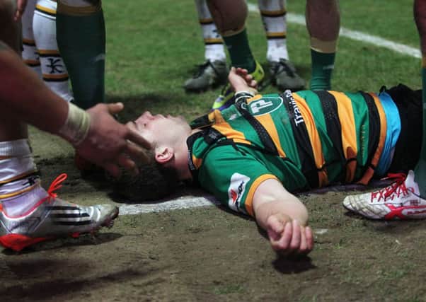 FLAT OUT - George North is knocked out after scoring his second try in the win over Wasps (Pictures: Sharon Lucey)