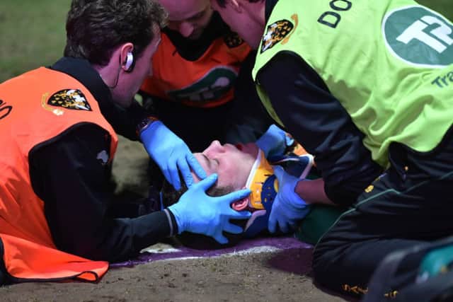 George North was stretchered off after taking a knee to the head from Wasps No.8 Nathan Hughes (picture: Dave Ikin)