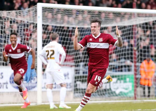 James Gray shows his delight after scoring the Cobblers' late winner against Luton at Sixfields (pictures: Kirsty Edmonds)