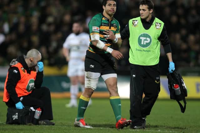 OUCH! - George Pisi leaves the field on Friday night after breaking a finger (Picture: Sharon Lucey)