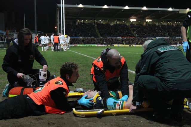George North was stretchered off after Hughes's knee made contact with his head (picture: Sharon Lucey)