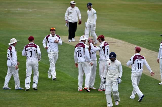 Northamptonshire celebrate a wicket for Mohammad Azharullah on day two of the County Championship clash with Gloucestershire. Pictures by Dave Ikin